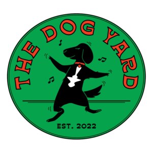 The Dog Yard Logo in Black and Red with a green background